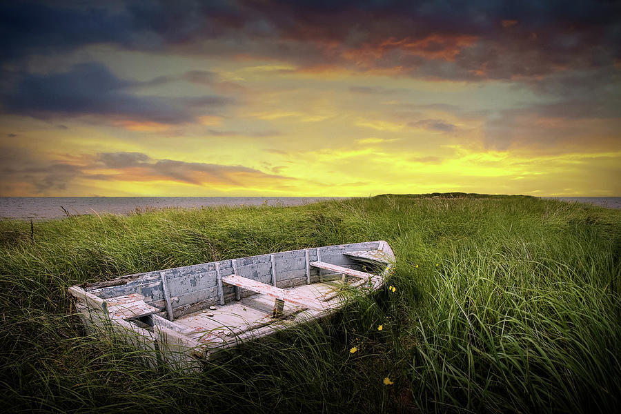 Stranded Row Boat in the Beach Grass at Sunrise on the shore on  Photograph by Randall Nyhof