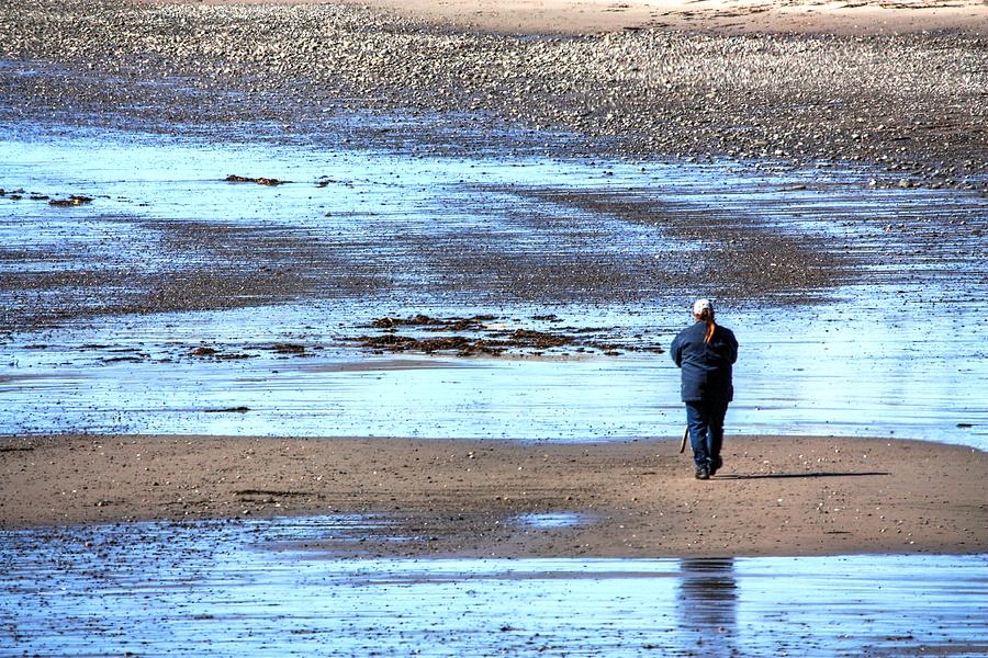 Stranger On The Shore Photograph