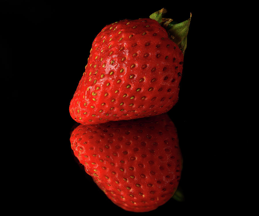 Strawberry Reflection On Black Photograph by Dan Sproul