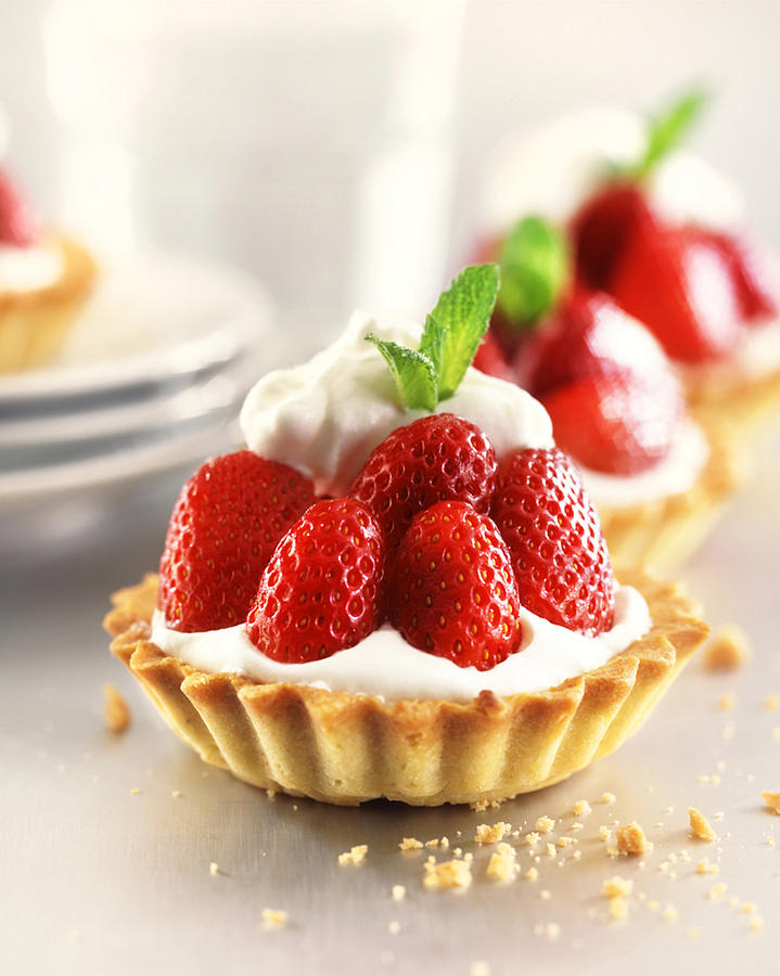 Strawberry tarts with custard Photograph by Dontstop
