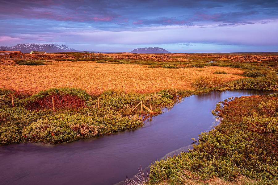 Stream in Myvatn at dusk Photograph by Ruben Vicente