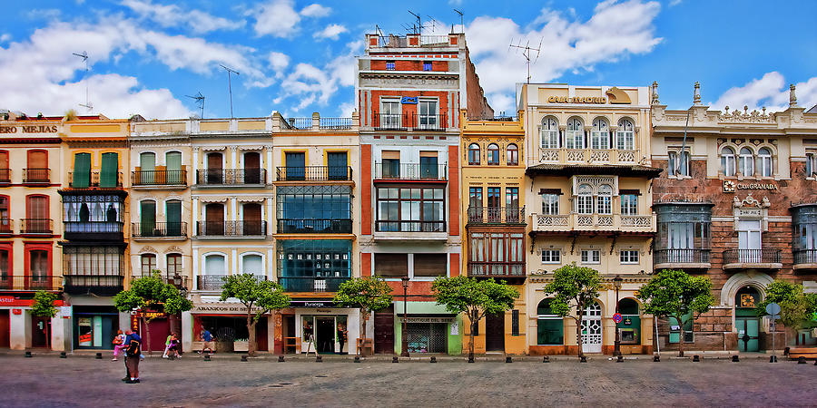 Street and colorful buildings, Seville, Spain Photograph by Tatiana Travelways
