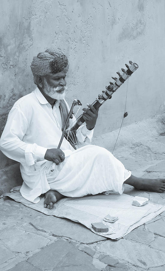 Street Artist Playing A Traditional Instrument  Photograph by La Moon Art
