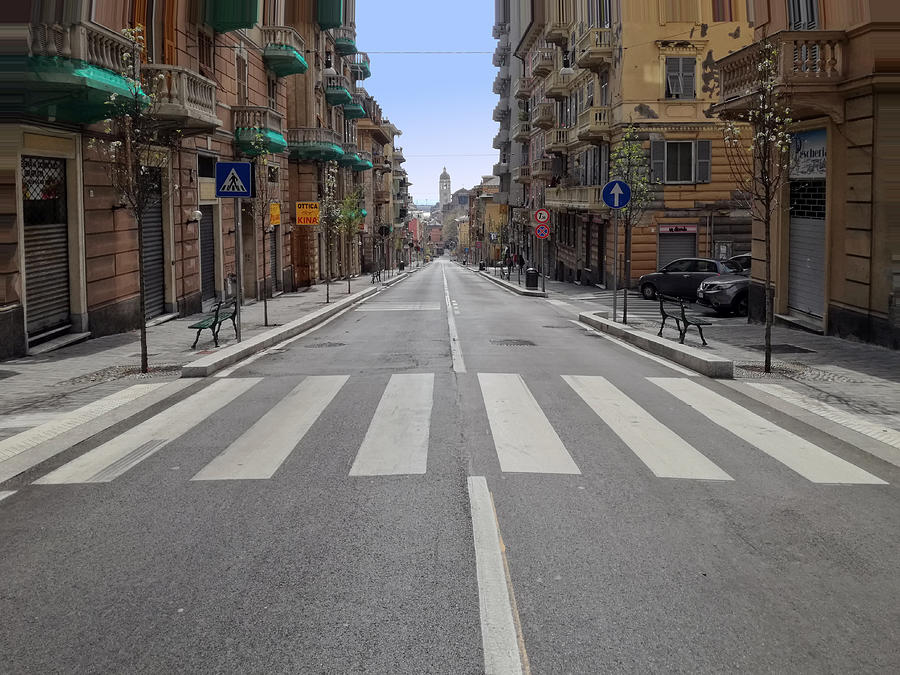 Street in a deserted city due to the Covid-19 virus a Genoa, Italy. Photograph by Massimo Scarselletta