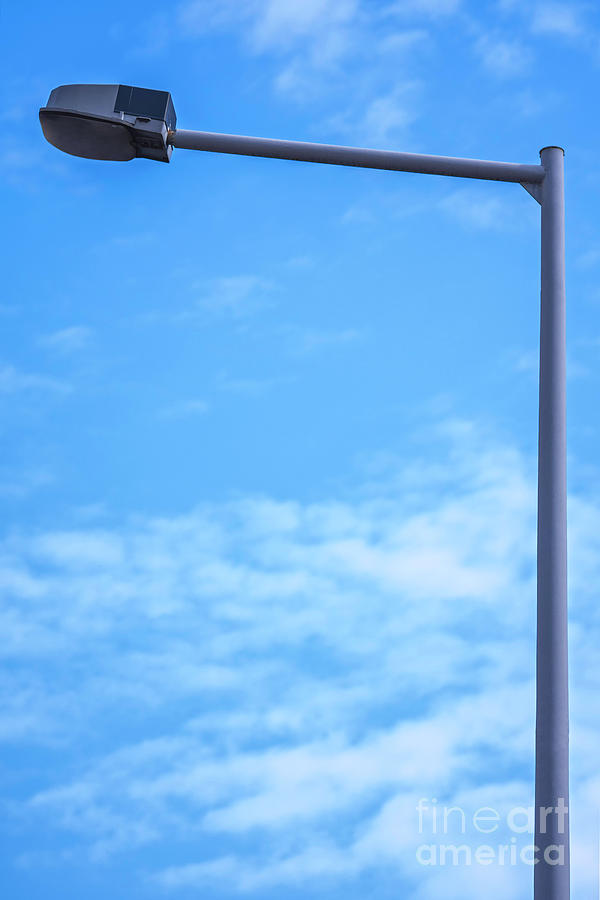 Street light and clear blue sky Photograph by Mendelex Photography