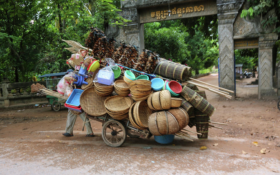 Street Merchant Cambodia Baskets  Photograph by Chuck Kuhn