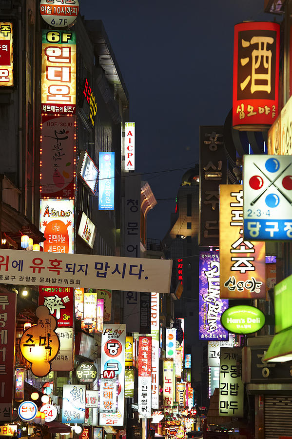 Street with shop signs, Seoul Photograph by Andrea Pistolesi
