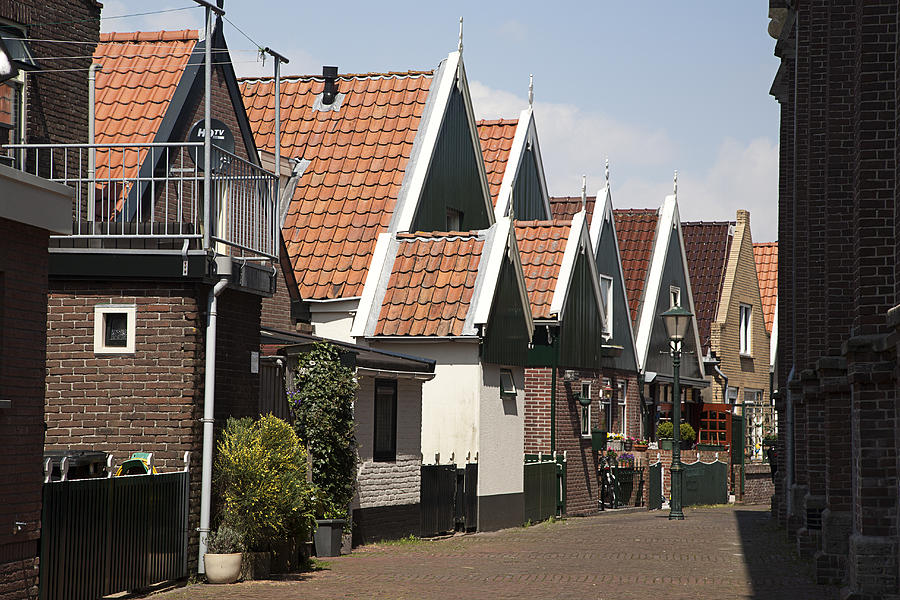 Street with traditional houses Photograph by Roel Meijer