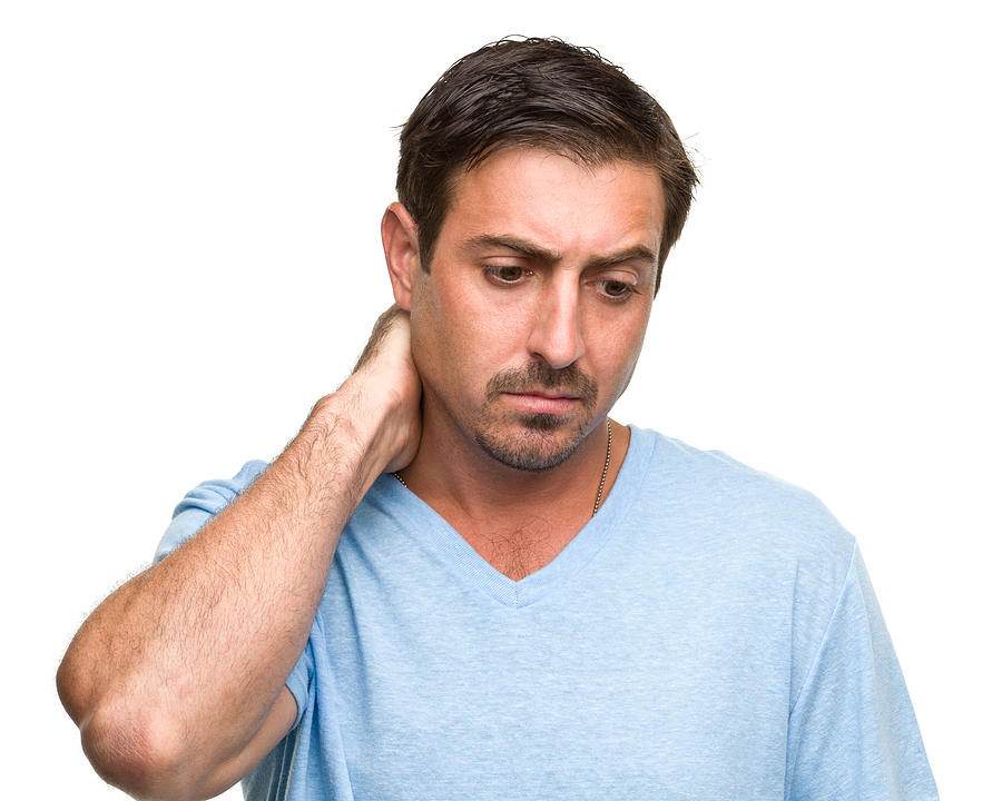 Stressed Man Rubs Neck Photograph by Drbimages