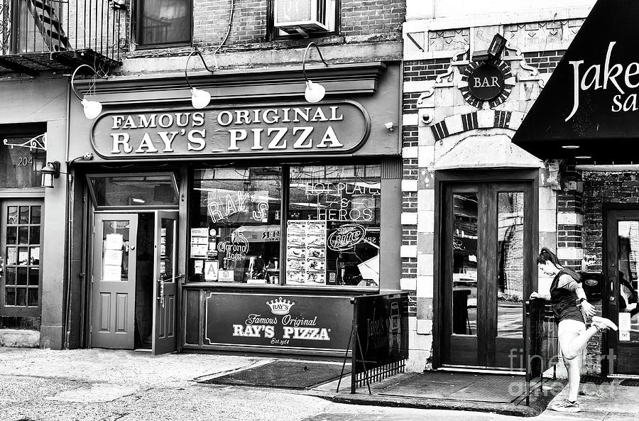 Stretching in front of Rays Pizza New York City Photograph by John Rizzuto