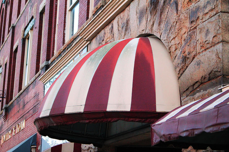 Striped Awning On Building  Photograph by Cynthia Guinn
