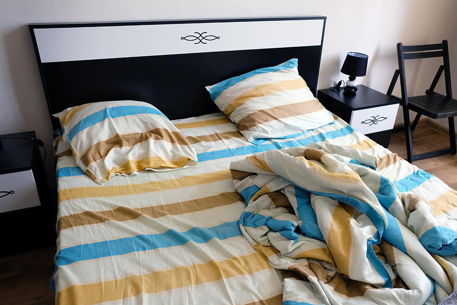 Striped sheets, pillows and duvet Photograph by Tetiana Kolubai