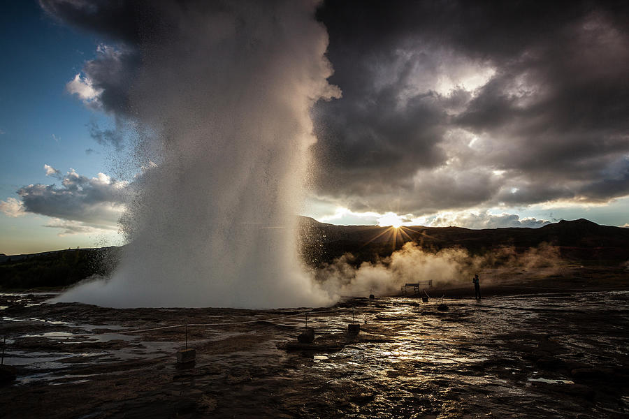 Strokkur geyser erupting Photograph by Ruben Vicente