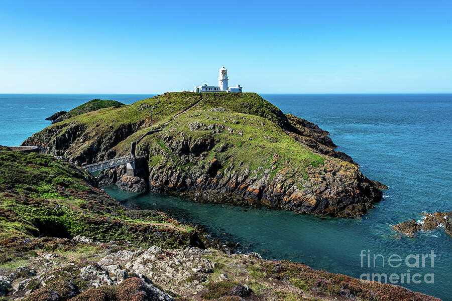 Strumble Head Lighthouse At The Atlantic Coast Of South Wales In Pembrokeshire, United Kingdom Photograph by Andreas Berthold