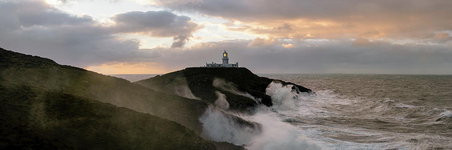 Strumble Head Lighthouse Storm waves Pembrokeshire Coast Wales Photograph by Sonny Ryse