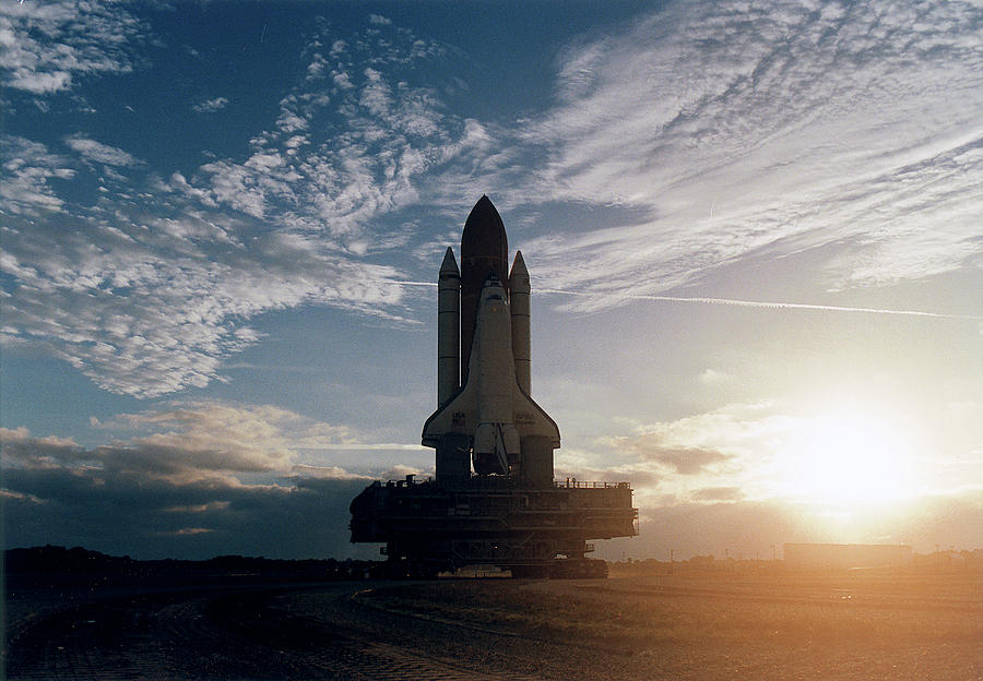 Space Photograph - STS-82 Discovery Rollout by Nasa