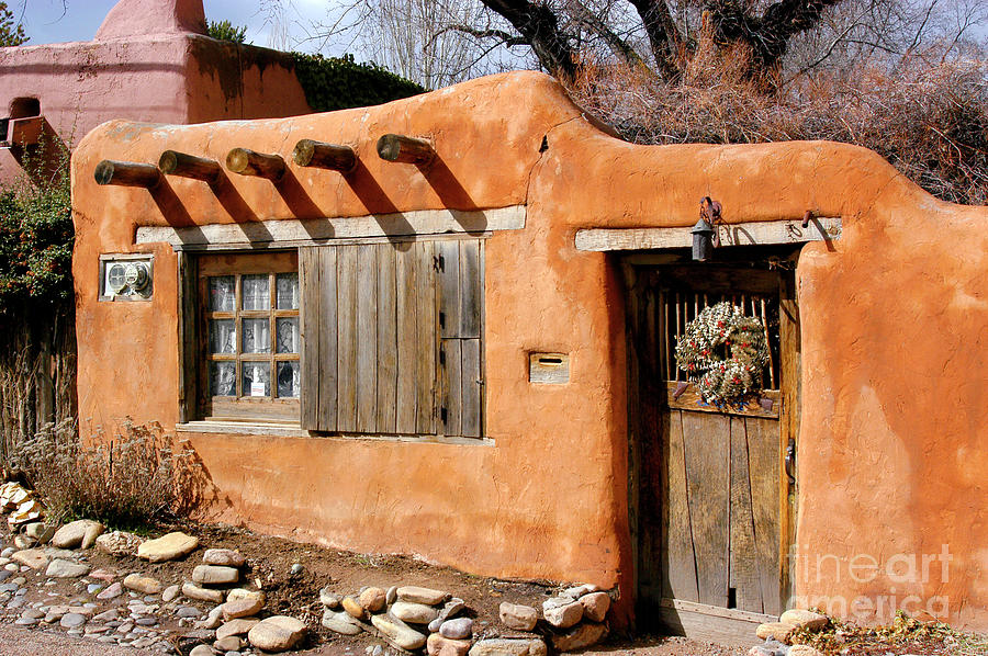 Stucco and Wood Santa Fe Styled home.  Photograph by Gunther Allen