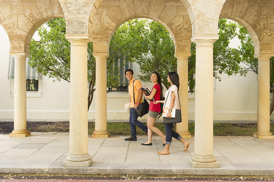 Students walking on campus Photograph by Jacobs Stock Photography Ltd