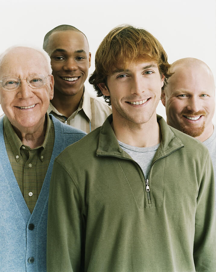 Studio Portrait of Four Men of Mixed Ages Photograph by Digital Vision.