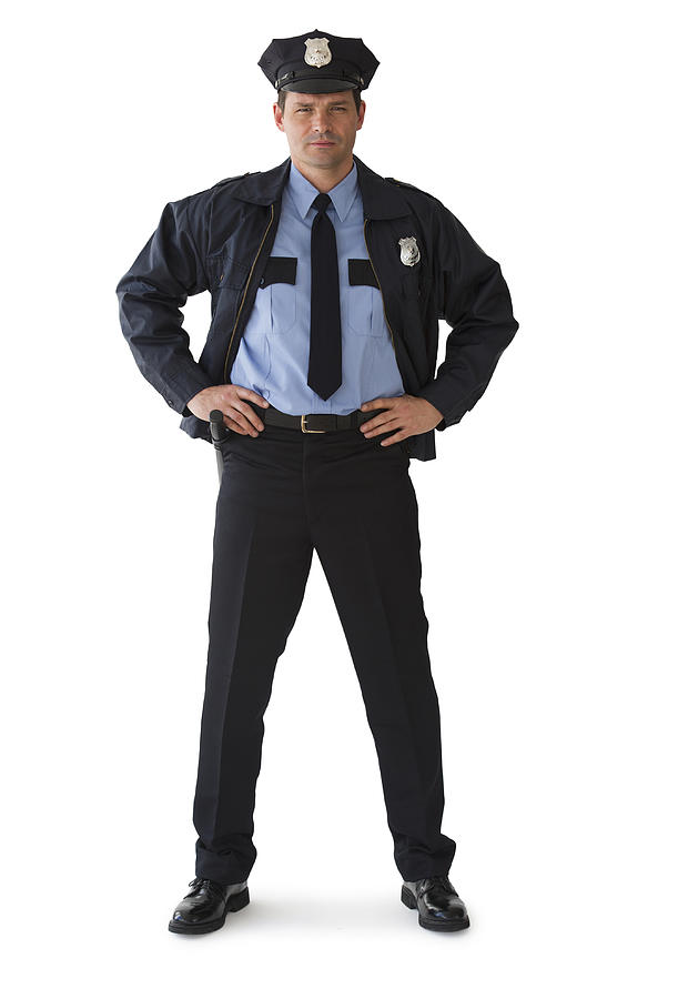 Studio portrait of police officer Photograph by Tetra Images