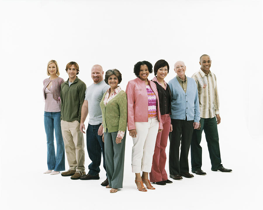 Studio Shot of a Mixed Age, Multiethnic Group of Men and Women Standing in a V Shape Photograph by Digital Vision.
