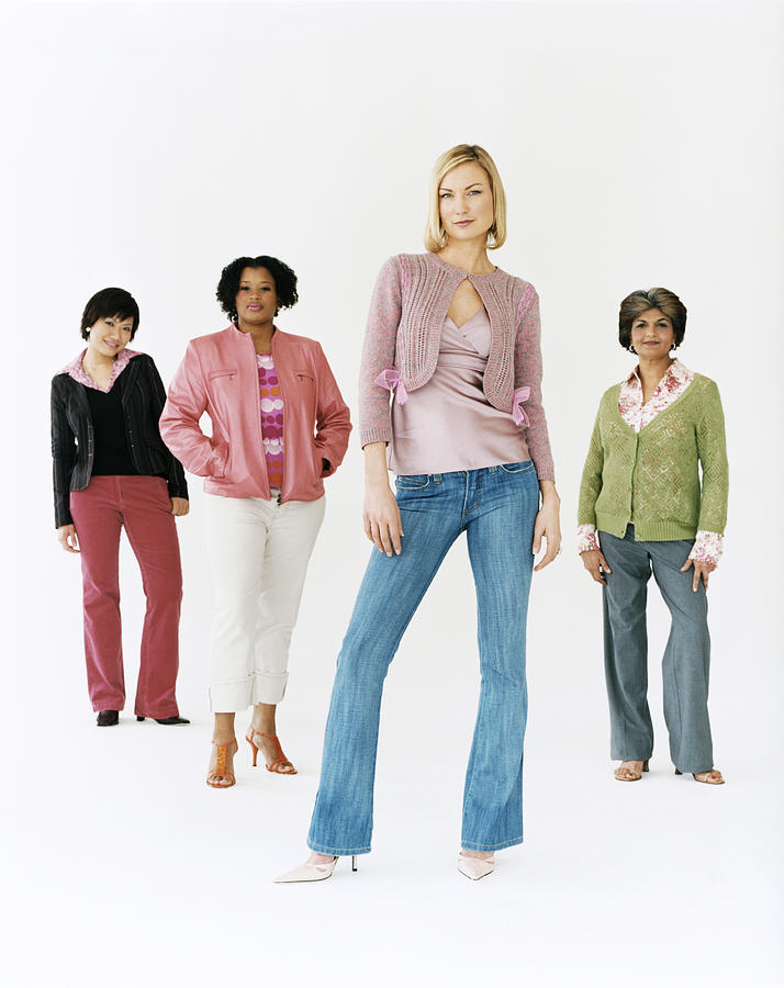 Studio Shot of a Mixed Age, Multiethnic Group of Women With Attitude, Thirty something Woman at the Front Photograph by Digital Vision.