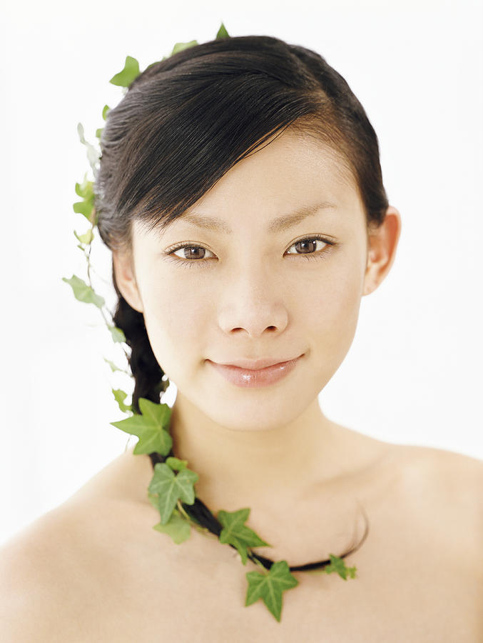 Studio Shot of a Woman With Leaves in Her Hair Photograph by Digital Vision.