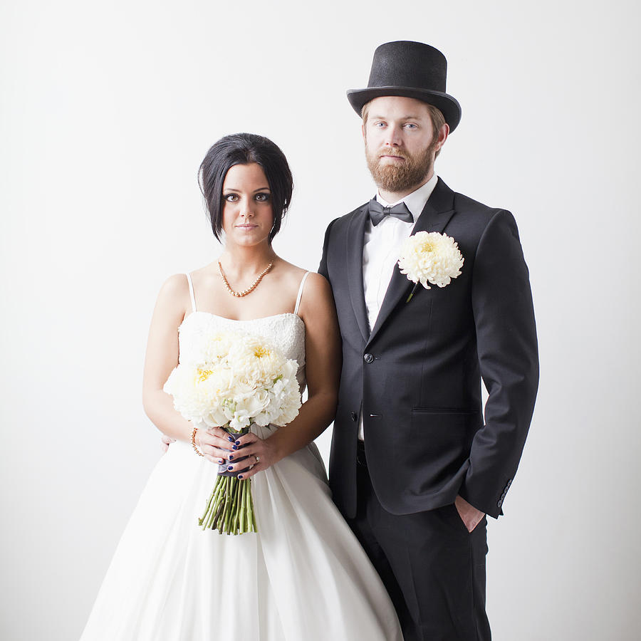 Studio Shot portrait of bride and groom Photograph by Jessica Peterson