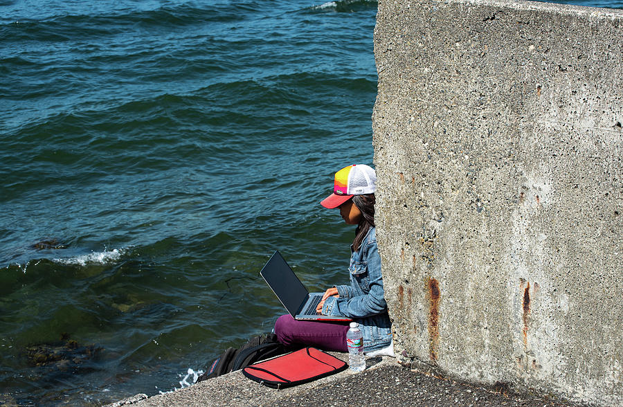 Studying by the Bay Photograph by Tom Cochran