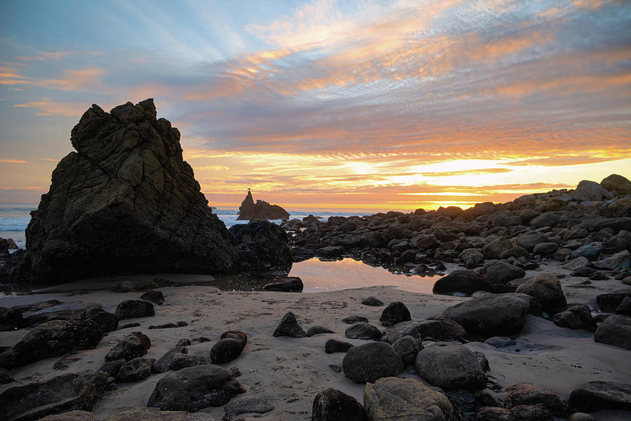 Stunning Sunset on Rocky Beach with Tide Pool Reflection Photograph by Matthew DeGrushe