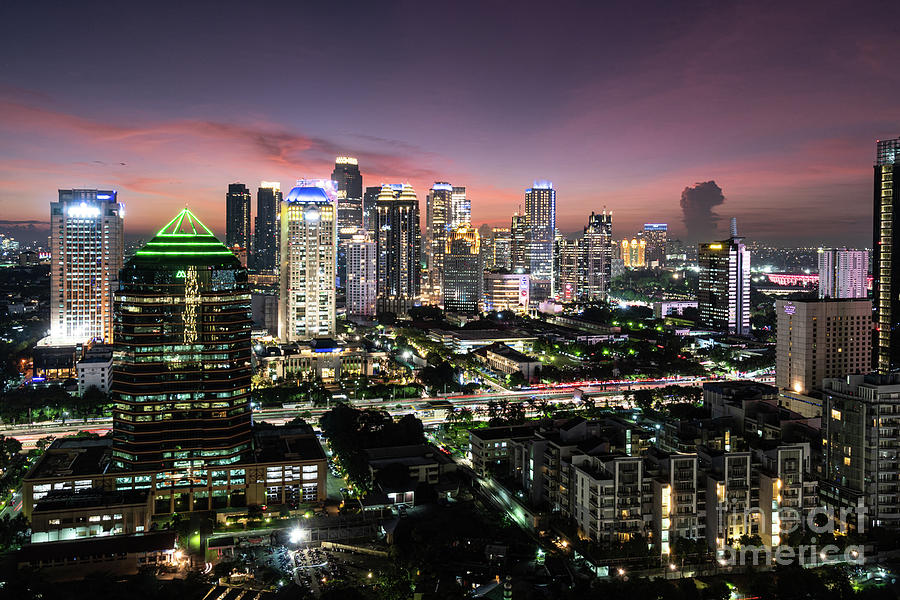 Stunning twilight over Jakarta south business district,  Photograph by Didier Marti