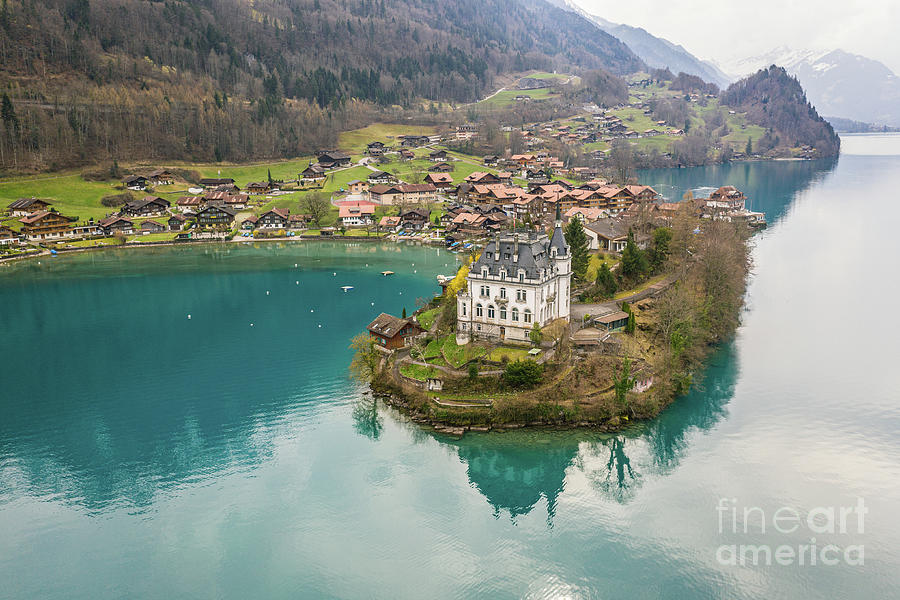 Stunning view of the famous Iseltwald village with a castle by l Photograph by Didier Marti