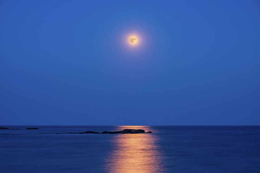 Sturgeon Full Moon Rises Over the Sea Photograph by Alexios Ntounas