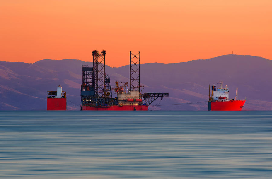 Submerging cargo ship Photograph by Mavroudakis Fotis Photography
