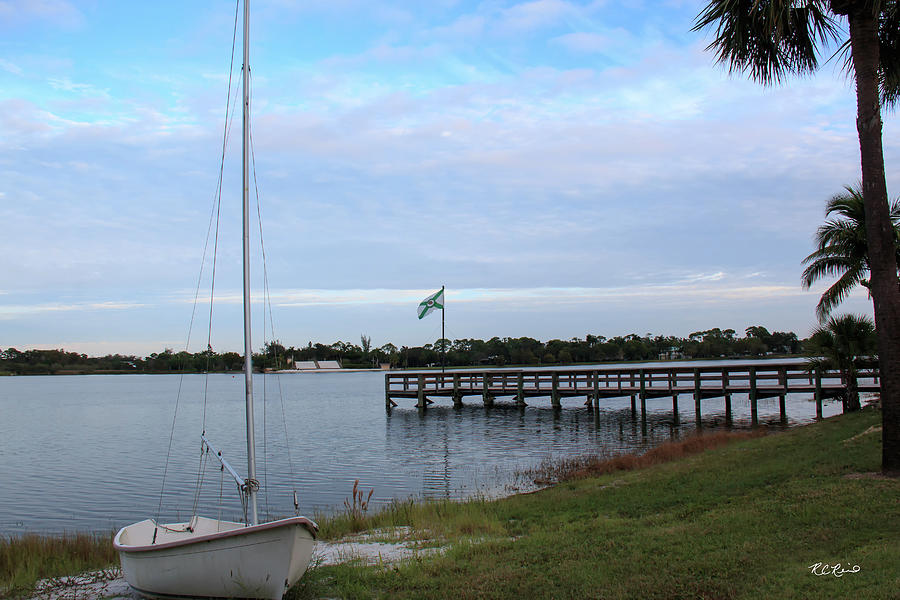 Sugden Regional Park - Peaceful View of Sailboat and Pier Photograph by Ronald Reid