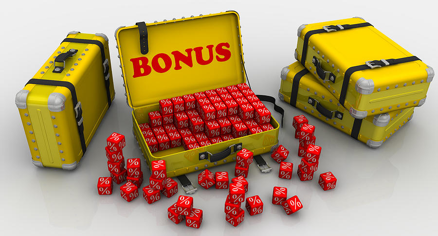 Suitcases with bonuses. Financial concept Photograph by Waldemarus