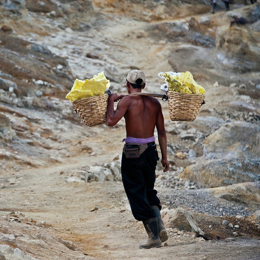 Sulfur carrier, Ijen.  Indonesia Photograph by Lie Yim