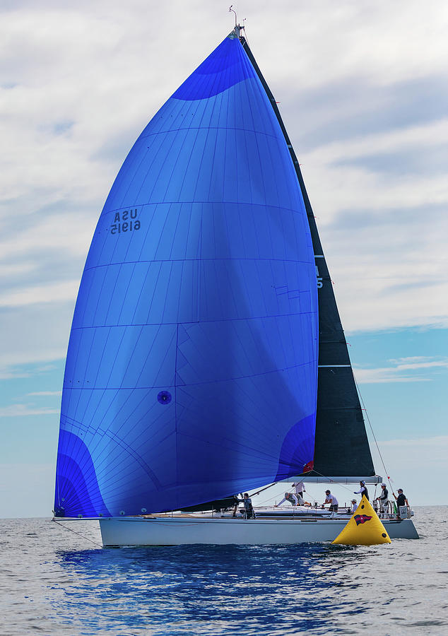 Summer Storm Racing Yacht with Blue Sail sailing in regatta in Newport