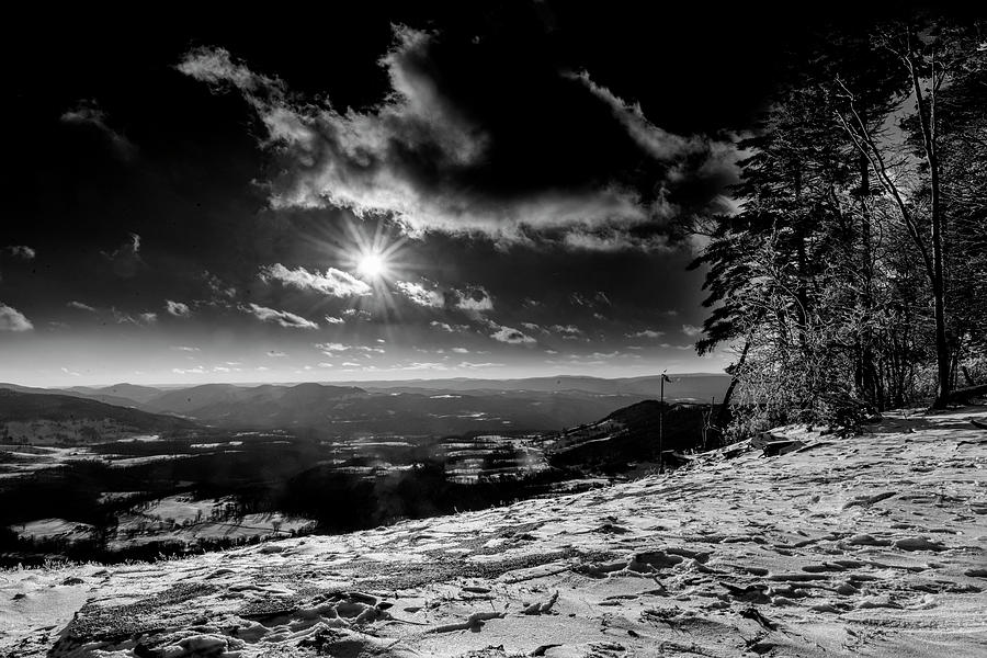 Sun across the valley black and white Photograph by Dan Friend