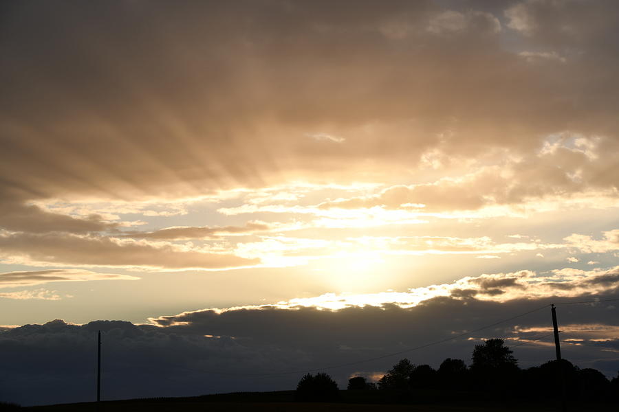 Sun beams behind cloud Photograph by Lamar Ratliff - Fine Art America