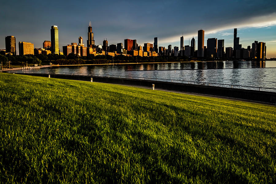 Sun begins to illuminate the Chicago Skyline Photograph by Sven Brogren