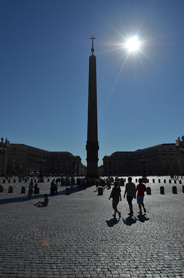 Sun Flare Silhouette on Saint Peter's Square Obelisk by Shawn O'Brien Sun Flare Silhouette on Saint Peter's Square Obelisk by Shawn O'Brien
