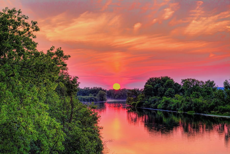 Sun Hanging Over The Rib River Photograph by Dale Kauzlaric