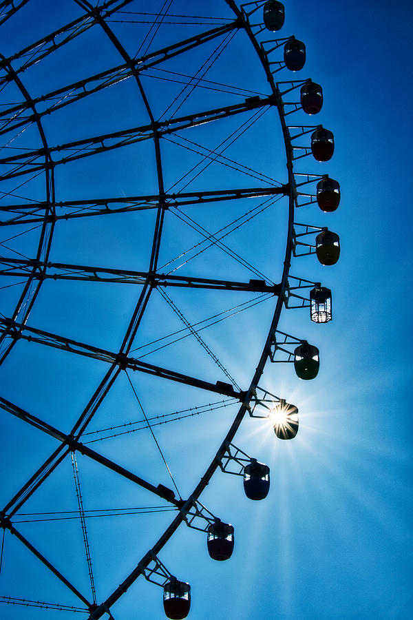 Sun in the Ferris Wheel - Tokyo - Japan Photograph by Stuart Litoff