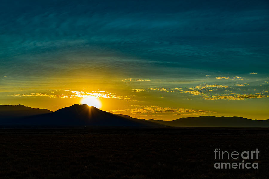 Sun Rising above the Pueblo Peak in Taos, New Mexico Photograph by JD ...