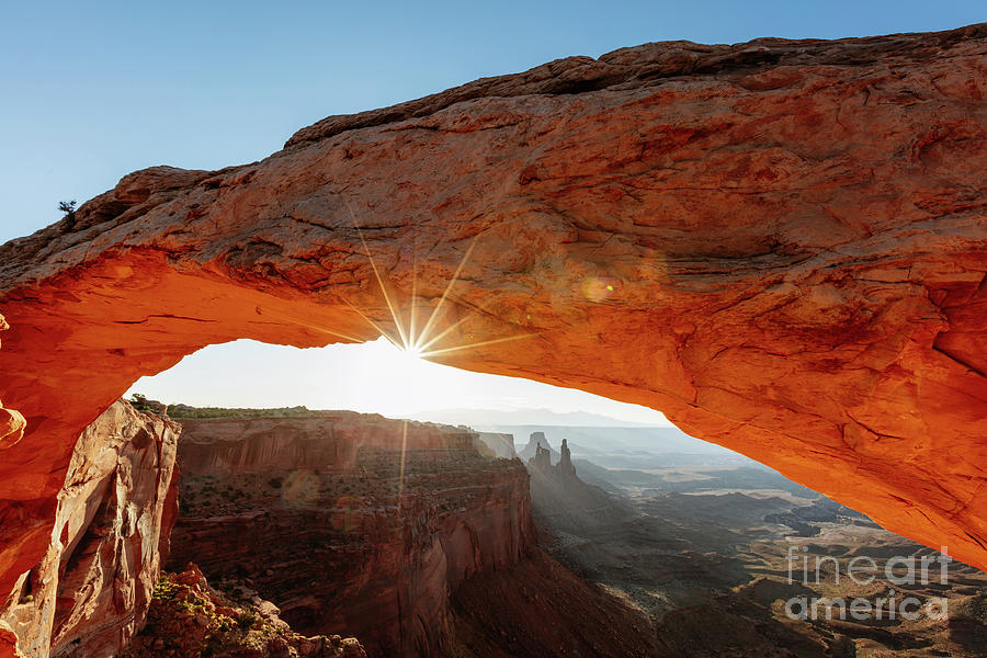 Sun rising at Mesa arch, Canyonlands Photograph by Matteo Colombo