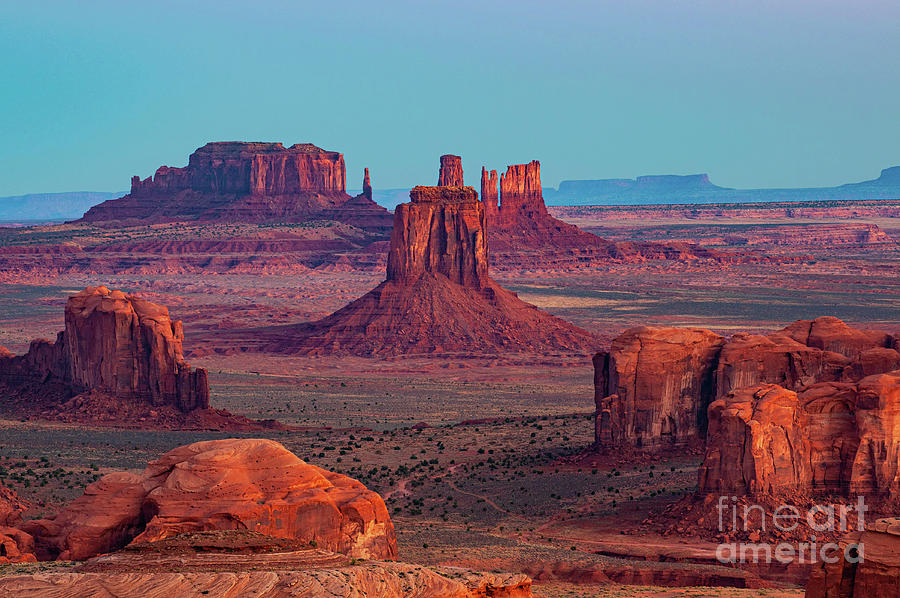 Sun Rising on Monument Valley Photograph by Bob Phillips