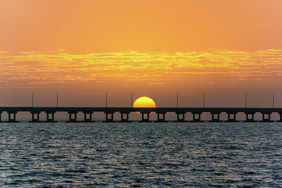 sun rising on Tampa Bay, Florida Photograph by Ann Moore