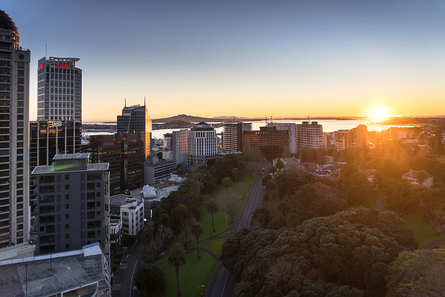 Sun Rising Over Auckland City Centre Photograph by Halbergman