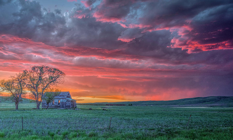 Sun Sets on Bad River Road in South Dakota Photograph by Laura Hedien